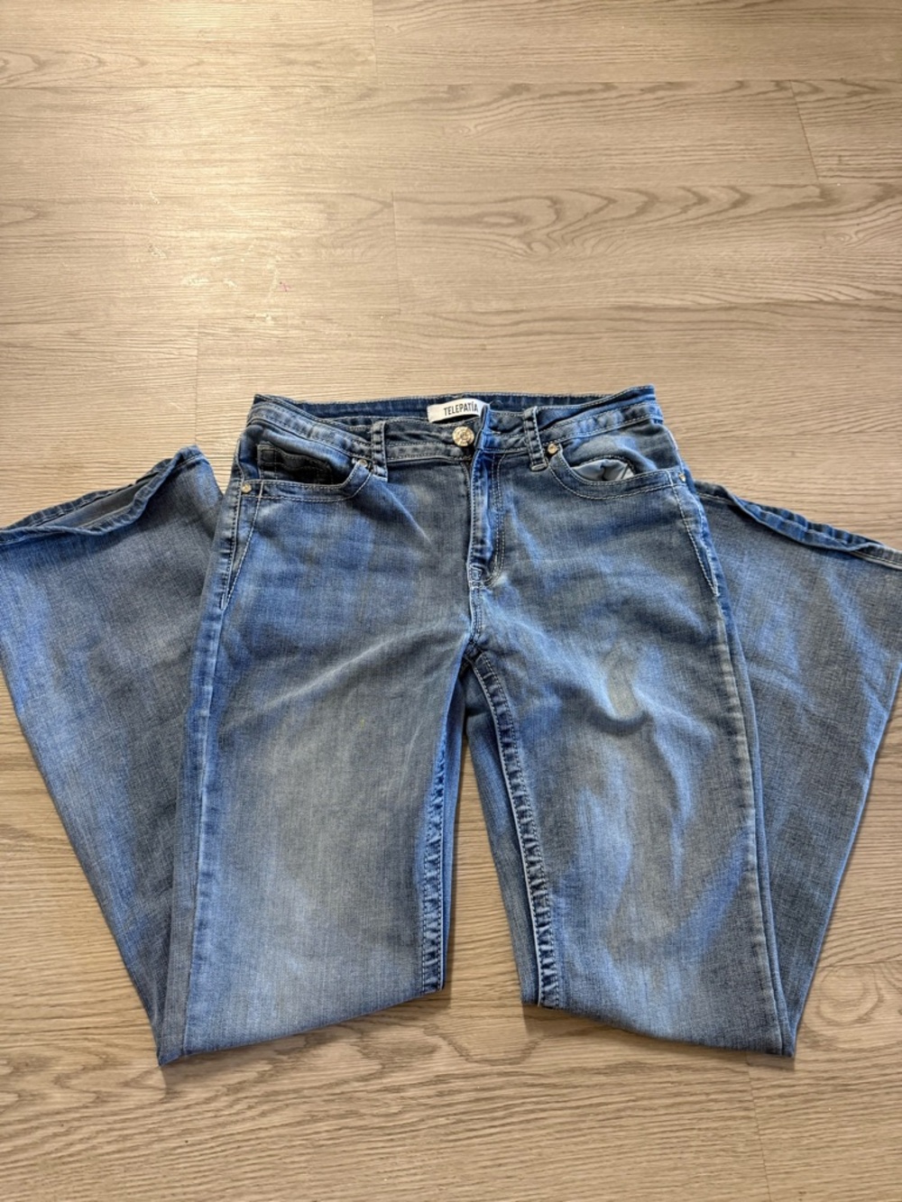 Telepatia brand women's blue jeans. Waist 30 In Length 38 In